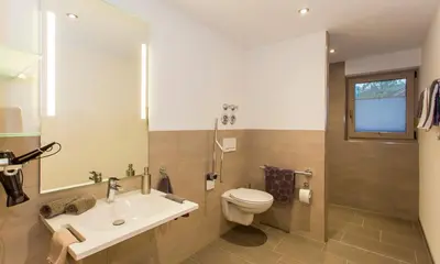 Ein Badezimmer in der Unterkunft Ferienwohnungen Alpenflair - barrierefrei urlauben