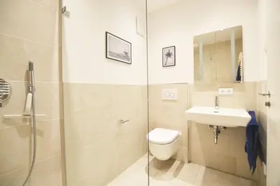 Ein Badezimmer in der Unterkunft Modern apartment near downtown