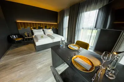 Ein Bett oder Betten in einem Zimmer der Unterkunft MY HOME MY HOTEL Rosenheim