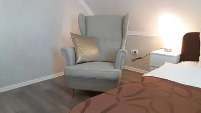 Ein Bett oder Betten in einem Zimmer der Unterkunft Müller Residenz Zur S-Bahn Karlsfeld