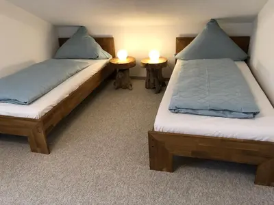 Ein Bett oder Betten in einem Zimmer der Unterkunft Goldbichl