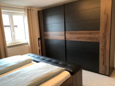 Ein Bett oder Betten in einem Zimmer der Unterkunft Goldbichl