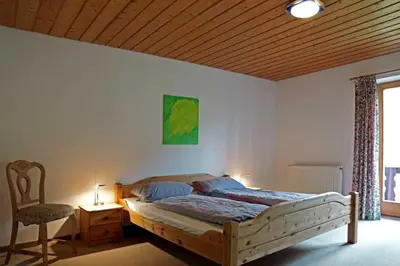 Ein Bett oder Betten in einem Zimmer der Unterkunft Ferienwohnung Del Toso