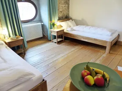 Ein Bett oder Betten in einem Zimmer der Unterkunft Gäste- und Tagungszentrum im Don Bosco Kloster Benediktbeuern