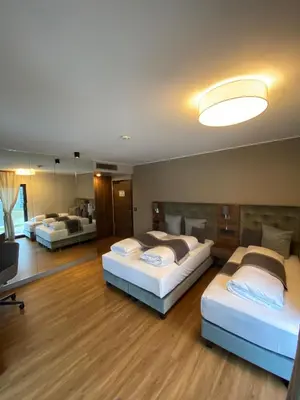 Ein Bett oder Betten in einem Zimmer der Unterkunft Intergroup Business & Design Hotel Ingolstadt