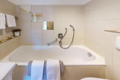 Ein Badezimmer in der Unterkunft Alberta*****