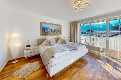 Ein Bett oder Betten in einem Zimmer der Unterkunft Alberta*****