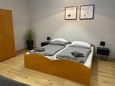 Ein Bett oder Betten in einem Zimmer der Unterkunft Ferienwohnung Peißenberg
