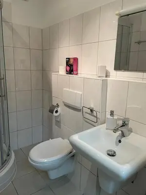Ein Badezimmer in der Unterkunft Ferienwohnung Peißenberg