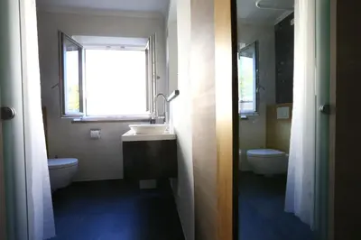 Ein Badezimmer in der Unterkunft CasaKarita