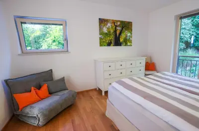 Ein Bett oder Betten in einem Zimmer der Unterkunft Gastl Ferienwohnung und Bootsverleih