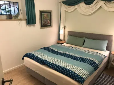 Ein Bett oder Betten in einem Zimmer der Unterkunft Ferienwohnung am Hörnle
