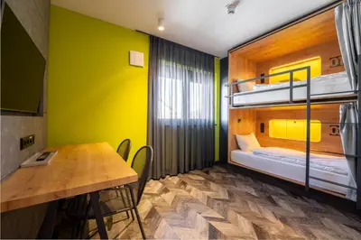 Ein Bett oder Betten in einem Zimmer der Unterkunft House of Records