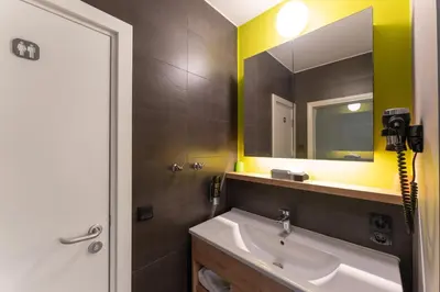 Ein Badezimmer in der Unterkunft House of Records