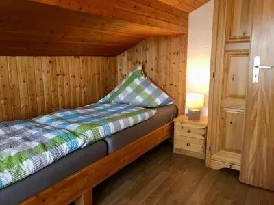 Ein Bett oder Betten in einem Zimmer der Unterkunft Ferienwohnung am Chiemsee