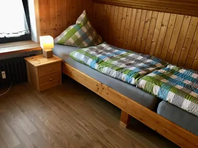 Ein Bett oder Betten in einem Zimmer der Unterkunft Ferienwohnung am Chiemsee