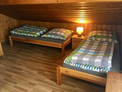 Ein Bett oder Betten in einem Zimmer der Unterkunft Ferienwohnung am Chiemsee