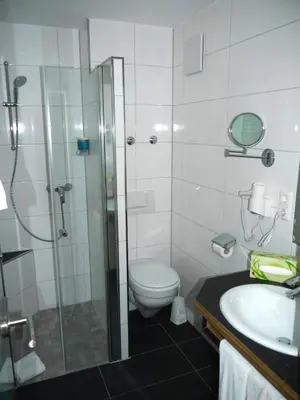 Ein Badezimmer in der Unterkunft Hotel Fortuna