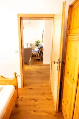 Ein Bett oder Betten in einem Zimmer der Unterkunft Schönes Ammertal zwei großzügige Ferienwohnungen ab 80qm