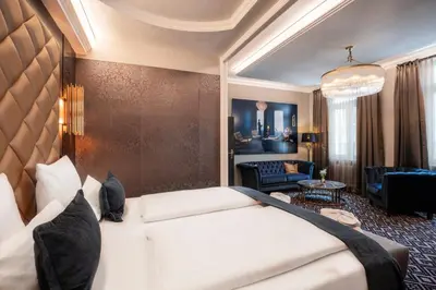 Ein Bett oder Betten in einem Zimmer der Unterkunft Boutique Hotel Germania