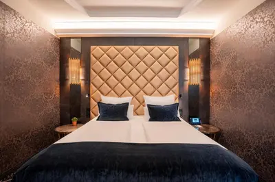 Ein Bett oder Betten in einem Zimmer der Unterkunft Boutique Hotel Germania