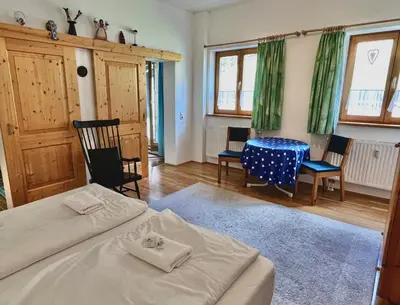 Ein Bett oder Betten in einem Zimmer der Unterkunft Ferienwohnung Spitzingsattel im Wanderparadies