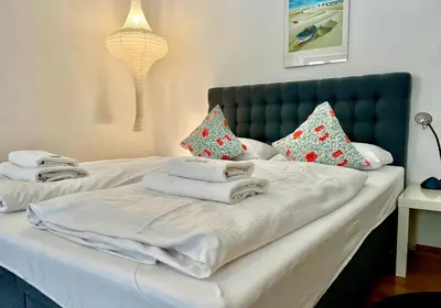 Ein Bett oder Betten in einem Zimmer der Unterkunft Ferienwohnung Spitzingsattel im Wanderparadies