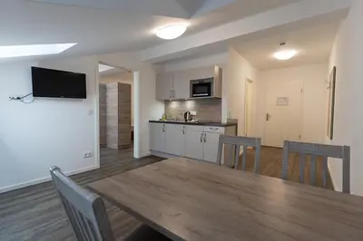 Küche/Küchenzeile in der Unterkunft Aparthotel Oberfeld West München, Selbstversorgerhotel