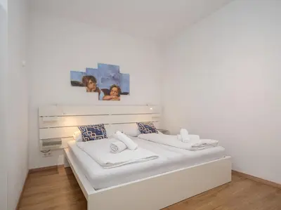 Ein Bett oder Betten in einem Zimmer der Unterkunft Moderne stilvolle Wohnung im Herzen Münchens