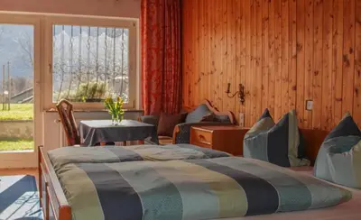 Ein Bett oder Betten in einem Zimmer der Unterkunft Gästehaus Gerti