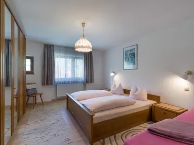 Ein Bett oder Betten in einem Zimmer der Unterkunft Gästehaus Gerti