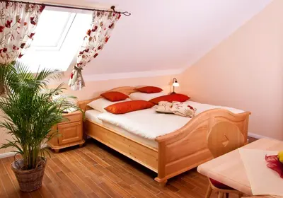 Ein Bett oder Betten in einem Zimmer der Unterkunft Pension Weindl