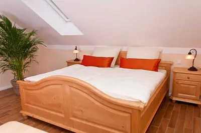 Ein Bett oder Betten in einem Zimmer der Unterkunft Pension Weindl