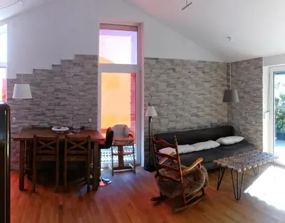 Ein Sitzbereich in der Unterkunft Haus am Schlossbach****