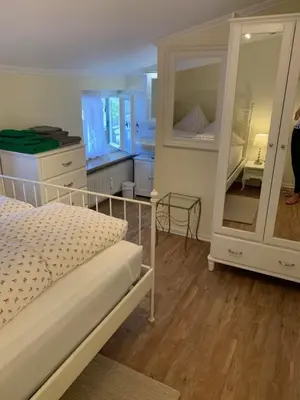 Ein Bett oder Betten in einem Zimmer der Unterkunft Ferienwohnung Giacomelli 3