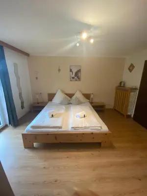 Ein Bett oder Betten in einem Zimmer der Unterkunft Alpenappartements Schwalbennestl