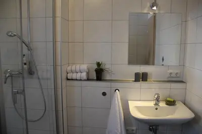 Ein Badezimmer in der Unterkunft Boardinghouse Frank
