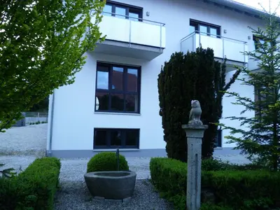 Ein Garten an der Unterkunft Boardinghouse Frank
