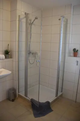 Ein Badezimmer in der Unterkunft Boardinghouse Frank