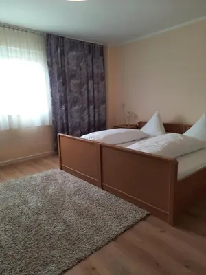 Ein Bett oder Betten in einem Zimmer der Unterkunft Hotel Adler