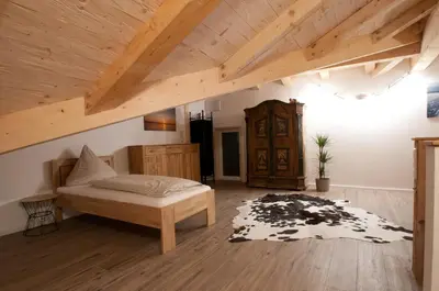 Ein Bett oder Betten in einem Zimmer der Unterkunft Alpenblick am Chiemsee