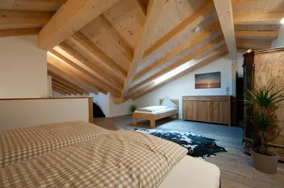 Ein Bett oder Betten in einem Zimmer der Unterkunft Alpenblick am Chiemsee