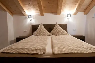 Ein Bett oder Betten in einem Zimmer der Unterkunft Alpenblick am Chiemsee