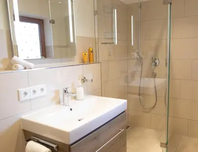 Ein Badezimmer in der Unterkunft Rottach Apartments - Ferienwohnungen am Tegernsee