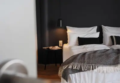 Ein Bett oder Betten in einem Zimmer der Unterkunft Bold Hotel München Giesing