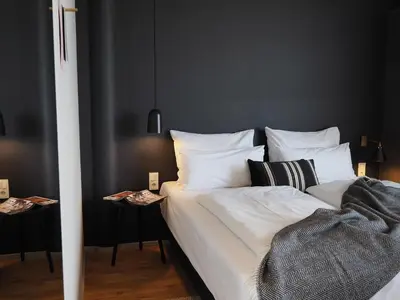 Ein Bett oder Betten in einem Zimmer der Unterkunft Bold Hotel München Giesing