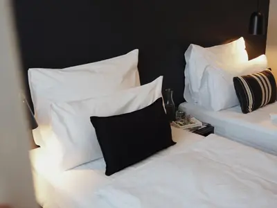 Ein Bett oder Betten in einem Zimmer der Unterkunft Bold Hotel München Giesing