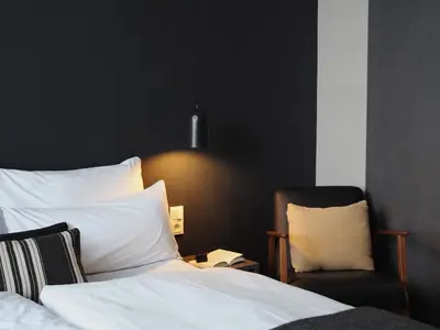 Ein Bett oder Betten in einem Zimmer der Unterkunft Bold Hotel München Giesing