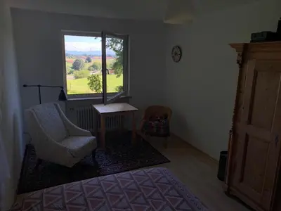 Ein Bett oder Betten in einem Zimmer der Unterkunft Zimmer mit Bergblick