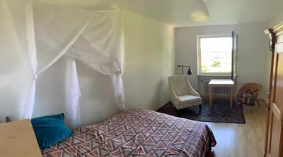 Ein Bett oder Betten in einem Zimmer der Unterkunft Zimmer mit Bergblick